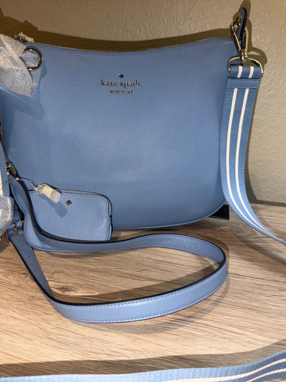 kate spade light blue pebbled leather crossbody with striped strap